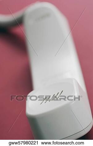 Close-up of a telephone receiver View Large Photo Image Stock Image - Close-up of a telephone receiver. Fotosearch