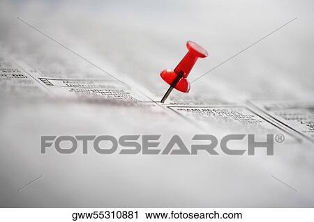 Close-up of a thumbtack in a newspaper View Large Photo Image Stock Image - Close-up of a thumbtack in a newspaper. Fotosearch