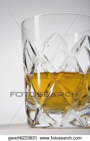 Close-up of a whiskey glass View Large Photo Image Stock Image - Close-up of a whiskey glass. Fotosearch