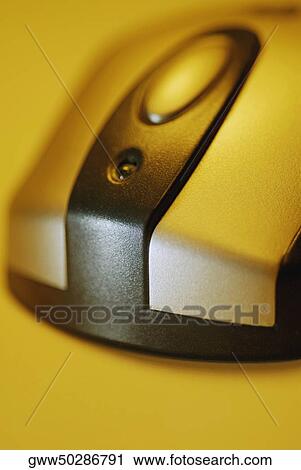 Stock Image - Close-up of a wireless computer mouse. Fotosearch