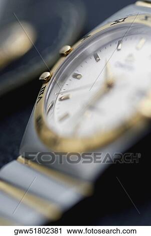 Close-up of a wrist watch View Large Photo Image Stock Image - Close-up of a wrist watch. Fotosearch