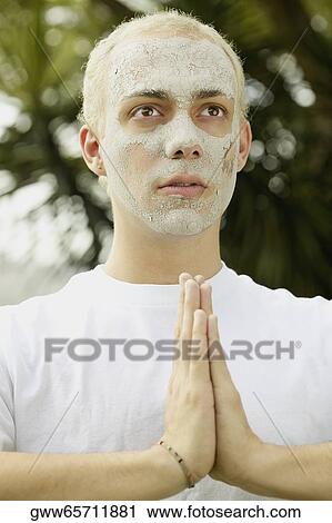 Close-up of a young man in a prayer position View Large Photo Image Stock Image - Close-up of a young man in a prayer position. Fotosearch