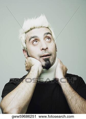 Close-up of a young man wearing a neck brace View Large Photo Image Stock Image - Close-up of a young man wearing a neck brace. Fotosearch