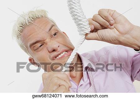 Close-up of a young man with a noose around his neck View Large Photo Image Stock Image - Close-up of a young man with a noose around his neck. Fotosearch