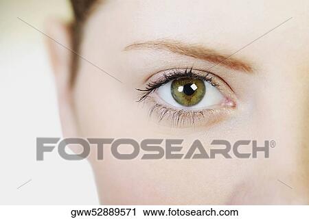Close-up of a young woman's eye View Large Photo Image Stock Image - Close-up of a young woman's eye. Fotosearch