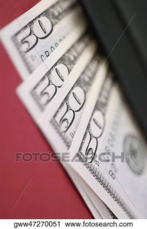 Stock Image - Close-up of American fifty dollar bills. Fotosearch
