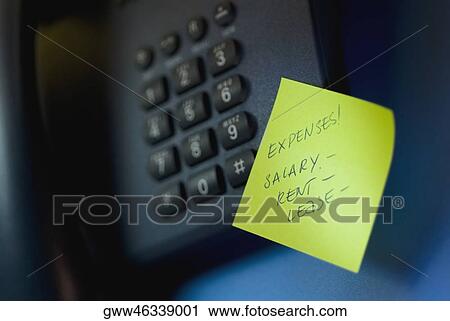 Close-up of an adhesive note and a telephone View Large Photo Image Stock Image - Close-up of an adhesive note and a telephone. Fotosearch