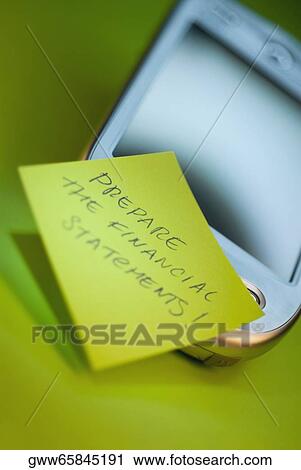 Close-up of an adhesive note on a mobile phone View Large Photo Image Stock Image - Close-up of an adhesive note on a mobile phone. Fotosearch