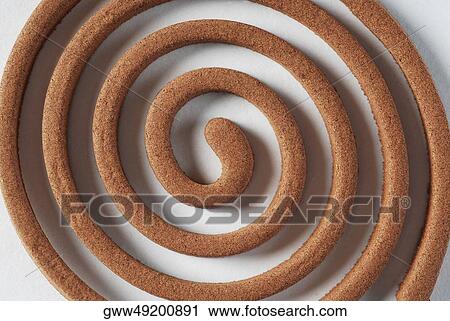 Close-up of an insect repellant coil View Large Photo Image Stock Image - Close-up of an insect repellant coil. Fotosearch