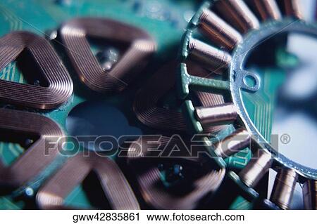 Stock Image - Close-up of coils of a machine. Fotosearch