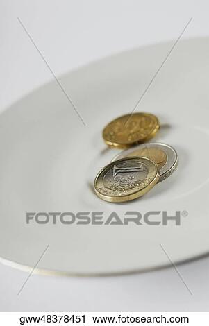 Close-up of European Union coins in a plate View Large Photo Image Stock Image - Close-up of European Union coins in a plate. Fotosearch