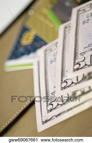 Close-up of fifty dollar bills and credit cards View Large Photo Image Stock Image - Close-up of fifty dollar bills and credit cards. Fotosearch