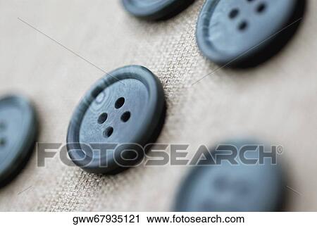 Stock Image - Close-up of five buttons. Fotosearch