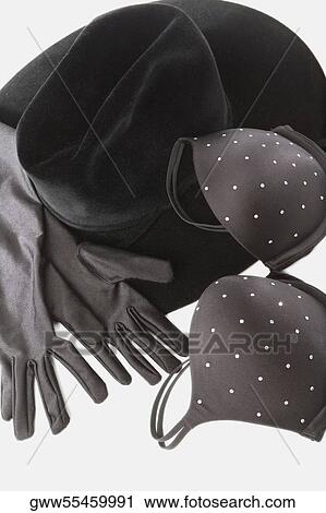 Close-up of gloves and a bra on a hat View Large Photo Image Stock Image - Close-up of gloves and a bra on a hat. Fotosearch