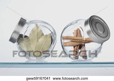 Close-up of herbs in two jars View Large Photo Image Stock Image - Close-up of herbs in two jars. Fotosearch