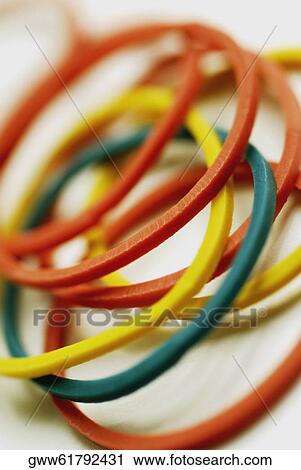 Close-up of multi-colored plastic bracelets View Large Photo Image Stock Image - Close-up of multi-colored plastic bracelets. Fotosearch