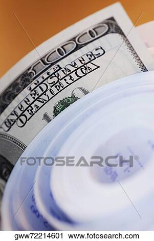 Close-up of one hundred dollar bill with a roll of adding machine tape View Large Photo Image Stock Image - Close-up of one hundred dollar bill with a roll of adding machine tape. Fotosearch