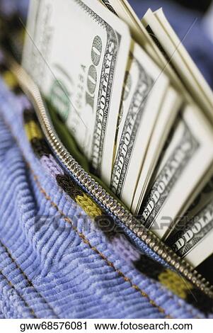 Close-up of one hundred dollar bills in a purse View Large Photo Image Stock Image - Close-up of one hundred dollar bills in a purse. Fotosearch