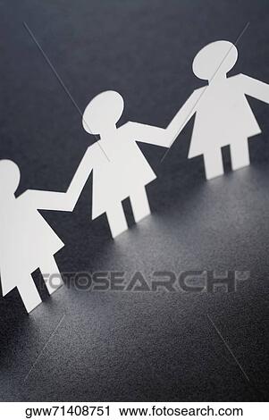 Close-up of paper chain dolls View Large Photo Image Stock Image - Close-up of paper chain dolls. Fotosearch
