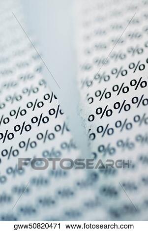 Stock Image - Close-up of paper with percentage sings. Fotosearch