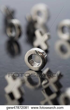 Close-up of pieces of a tic-tac-toe game View Large Photo Image Stock Image - Close-up of pieces of a tic-tac-toe game. Fotosearch