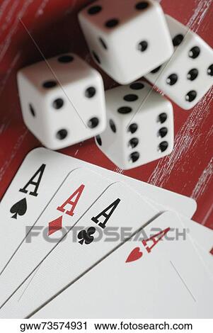 Close-up of playing cards with two pairs of dice View Large Photo Image Stock Image - Close-up of playing cards with two pairs of dice. Fotosearch