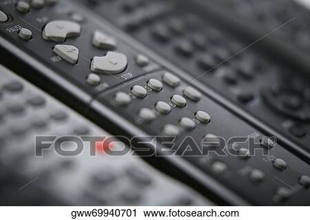 Close-up of remote controls View Large Photo Image Stock Image - Close-up of remote controls. Fotosearch