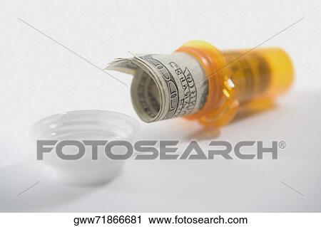 Close-up of rolled paper currency in a bottle View Large Photo Image Stock Image - Close-up of rolled paper currency in a bottle. Fotosearch
