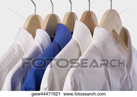 Close-up of shirts hanging View Large Photo Image Stock Image - Close-up of shirts hanging. Fotosearch
