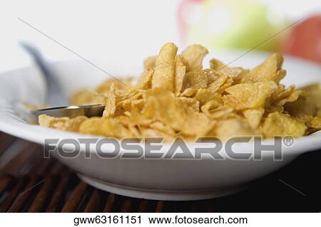 Close-up of snacks with a spoon in a plate View Large Photo Image Stock Image - Close-up of snacks with a spoon in a plate. Fotosearch
