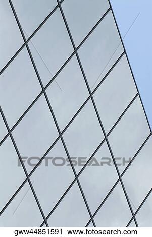 Close-up of the glass wall of a building View Large Photo Image Stock Image - Close-up of the glass wall of a building. Fotosearch