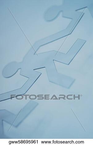 Close-up of the outline of paper chain dolls View Large Photo Image Stock Image - Close-up of the outline of paper chain dolls. Fotosearch