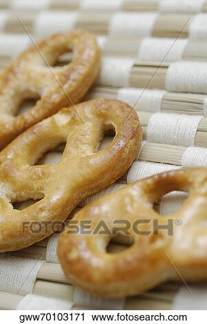 Close-up of three biscuits View Large Photo Image Stock Image - Close-up of three biscuits. Fotosearch