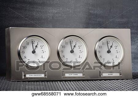 Close-up of three clocks View Large Photo Image Stock Image - Close-up of three clocks. Fotosearch
