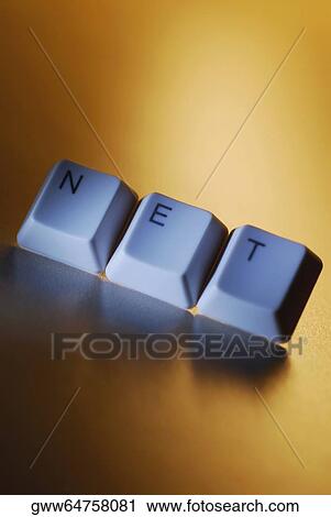 Stock Image - Close-up of three computer keys spelling the word NET. Fotosearch