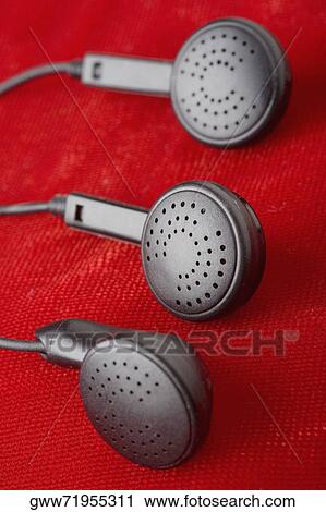 Close-up of three headphones View Large Photo Image Stock Image - Close-up of three headphones. Fotosearch