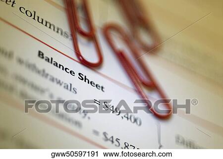 Close-up of three paper clips on the financial report View Large Photo Image Stock Image - Close-up of three paper clips on the financial report. Fotosearch