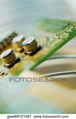 Close-up of transistors on a circuit board View Large Photo Image Stock Image - Close-up of transistors on a circuit board. Fotosearch