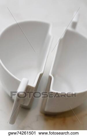 Close-up of two empty cups View Large Photo Image Stock Image - Close-up of two empty cups. Fotosearch