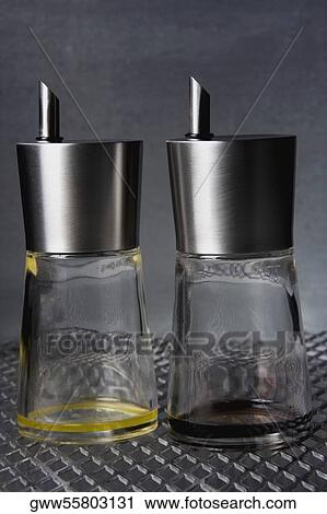 Stock Image - Close-up of two empty perfume bottles. Fotosearch