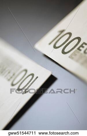 Close-up of two one hundred Euro banknotes View Large Photo Image Stock Image - Close-up of two one hundred Euro banknotes. Fotosearch