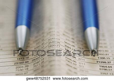 Close-up of two pens on stock market data View Large Photo Image Stock Image - Close-up of two pens on stock market data. Fotosearch