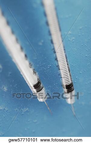 Close-up of two syringes View Large Photo Image Stock Image - Close-up of two syringes. Fotosearch