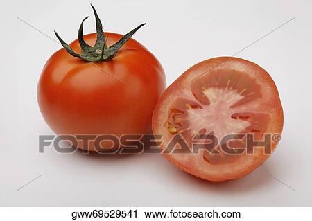 Close-up of two tomatoes View Large Photo Image Stock Image - Close-up of two tomatoes. Fotosearch