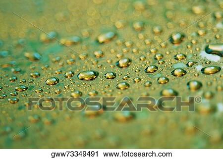 Close-up of water droplets on a surface View Large Photo Image Stock Image - Close-up of water droplets on a surface. Fotosearch