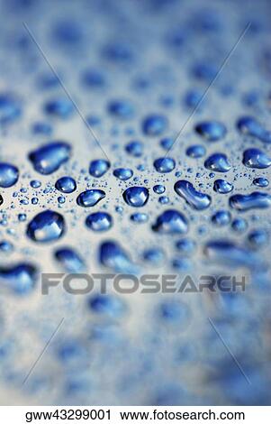 Stock Image - Close-up of water droplets. Fotosearch