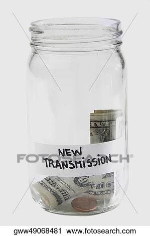 Dollar bills and coins in a jar View Large Photo Image Stock Image - Dollar bills and coins in a jar. Fotosearch