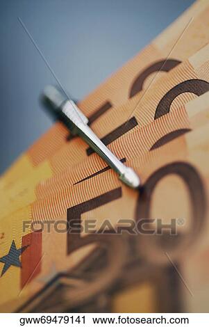 Euro notes attached to a pen View Large Photo Image Stock Image - Euro notes attached to a pen. Fotosearch
