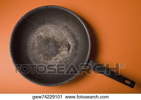 High angle view of a frying pan View Large Photo Image Stock Image - High angle view of a frying pan. Fotosearch