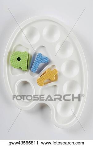 High angle view of alphabets on a palette View Large Photo Image Stock Image - High angle view of alphabets on a palette. Fotosearch